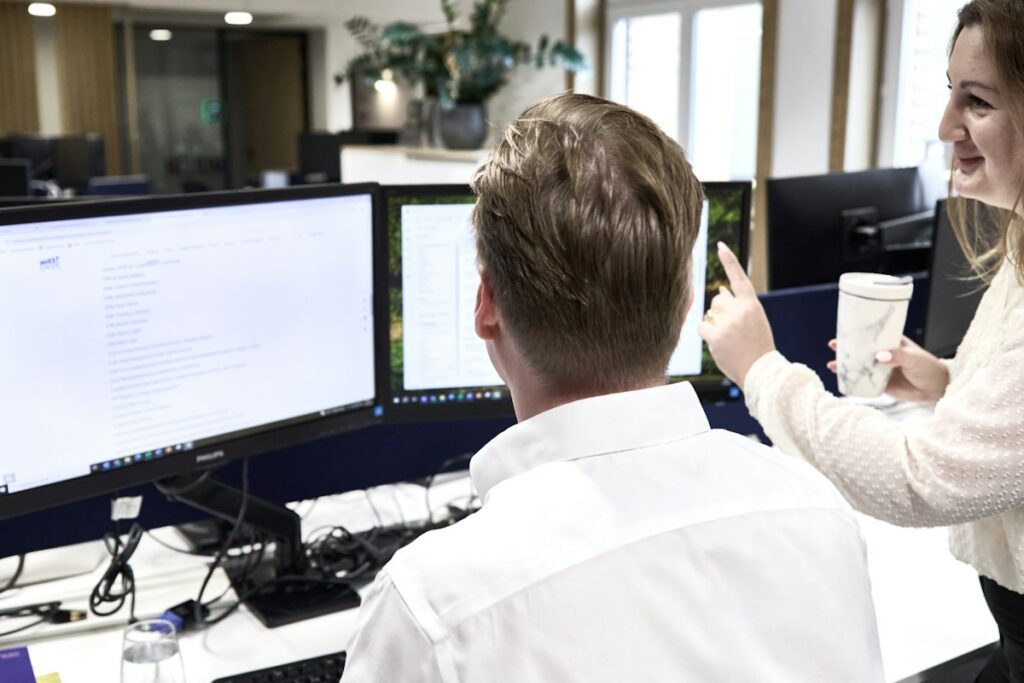 Recruiter reading candidate information on screen