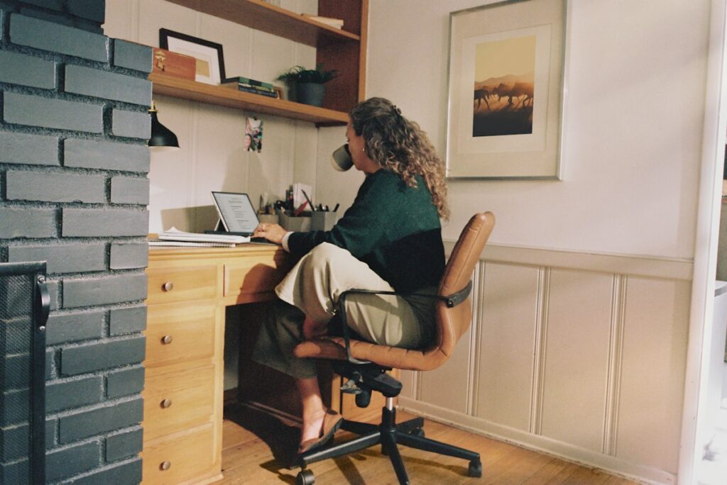Woman editing resume text at her desk